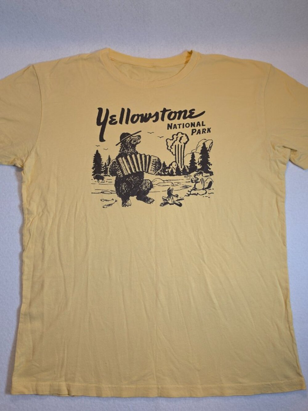 Yellowstone National Park Bear Playing Accordion Graphic T-Shirt Yellow Size L